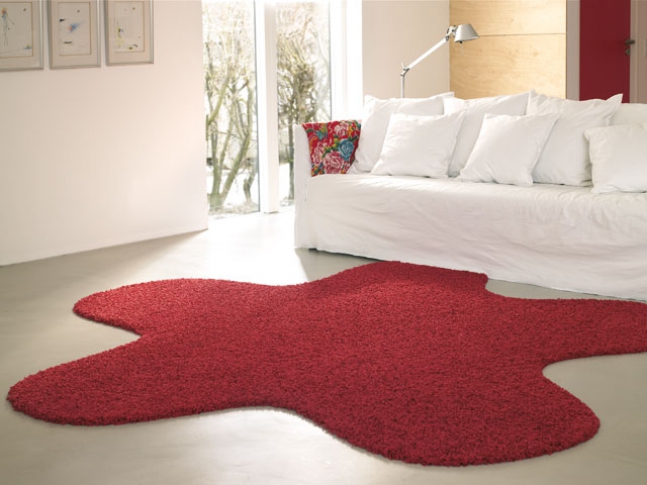 Kusový koberec Fletco rug Červený koberec Fletco Rug Fluffy ve tvaru hvězdice.